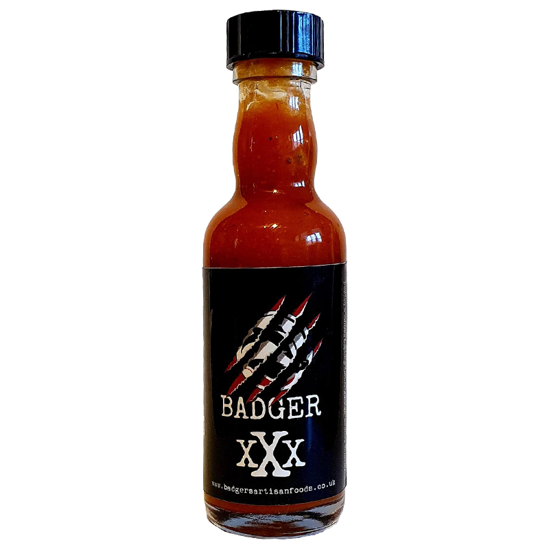 Picture of Badgers XXX Chilli Sauce in it's small 50mm bottle with black label.